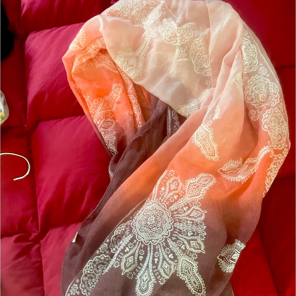 Beautifully bright colored scarf or wrap.